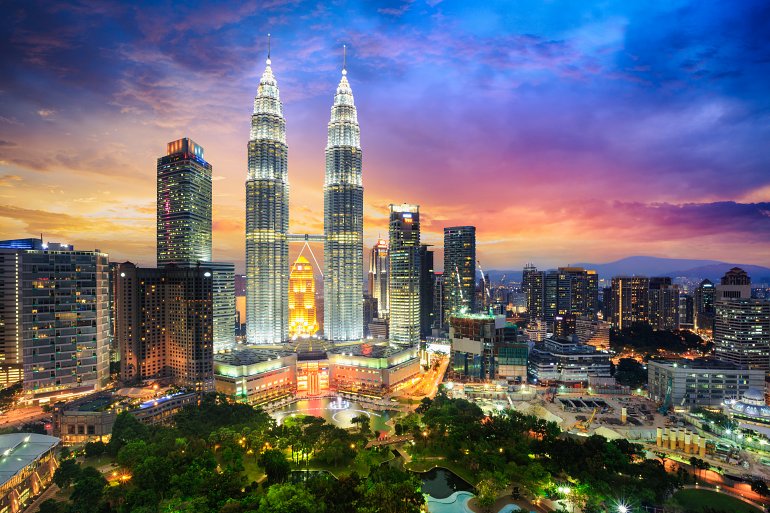 1 02 770 Kuala Lumpur Kuala lumpur city skyline at dusk shutterstock 745400290