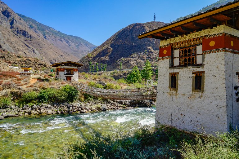 770 Bhutan Iron Chain Bridge of Tachog Lhakhang Paro River shutterstock 1252579141