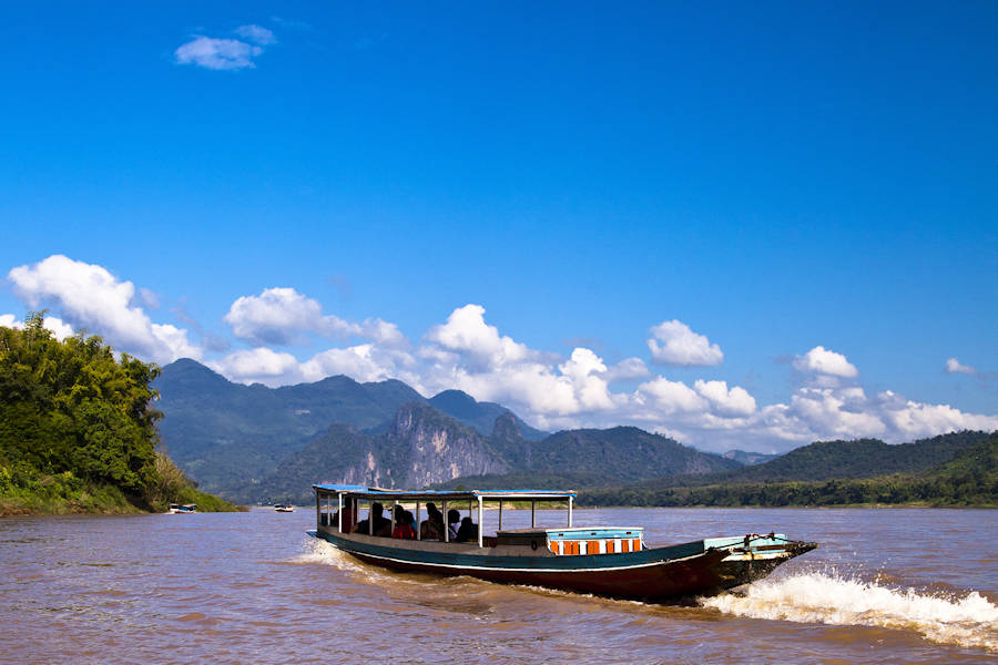 900 A boat ride on the Mekong River in Laos shutterstock 169850618