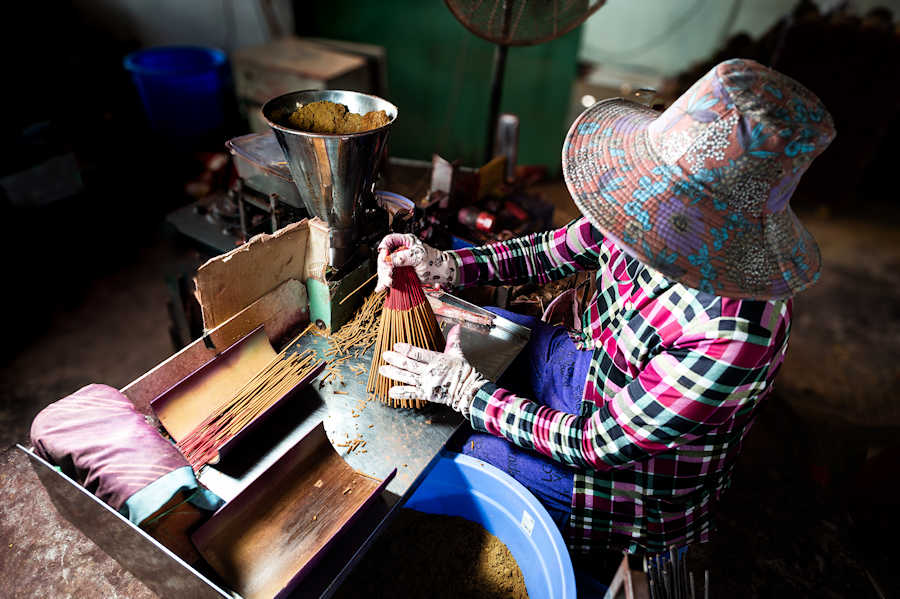 900 A woman producing incense sticks AdobeStock 1243680642