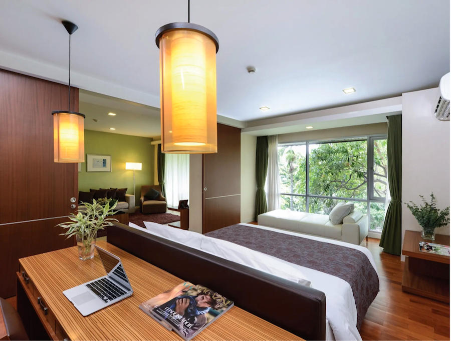 900 Deluxe One Bedroom Suite Bedroom min