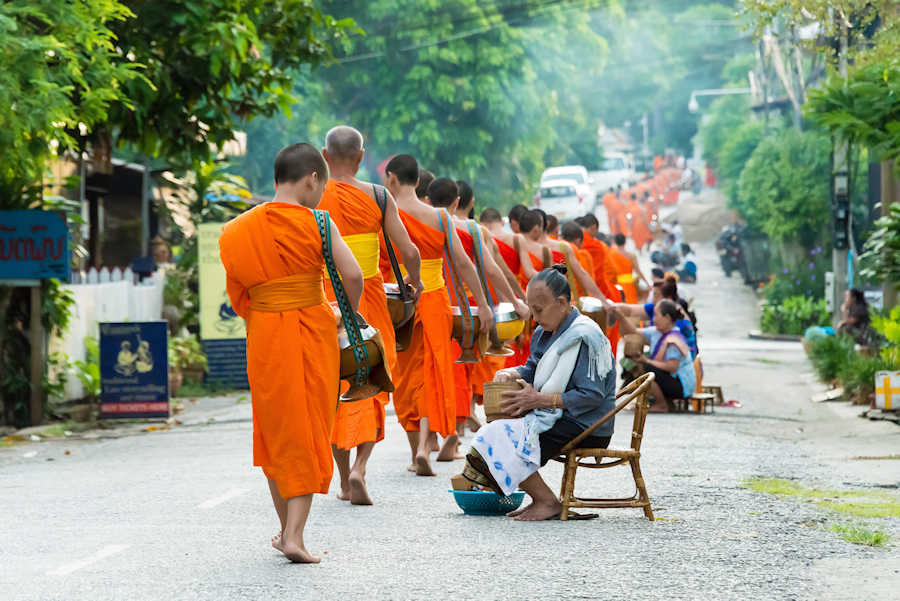 900 Editorial The tradition of giving alms to monks in Luang Prabang shutterstock 374020454